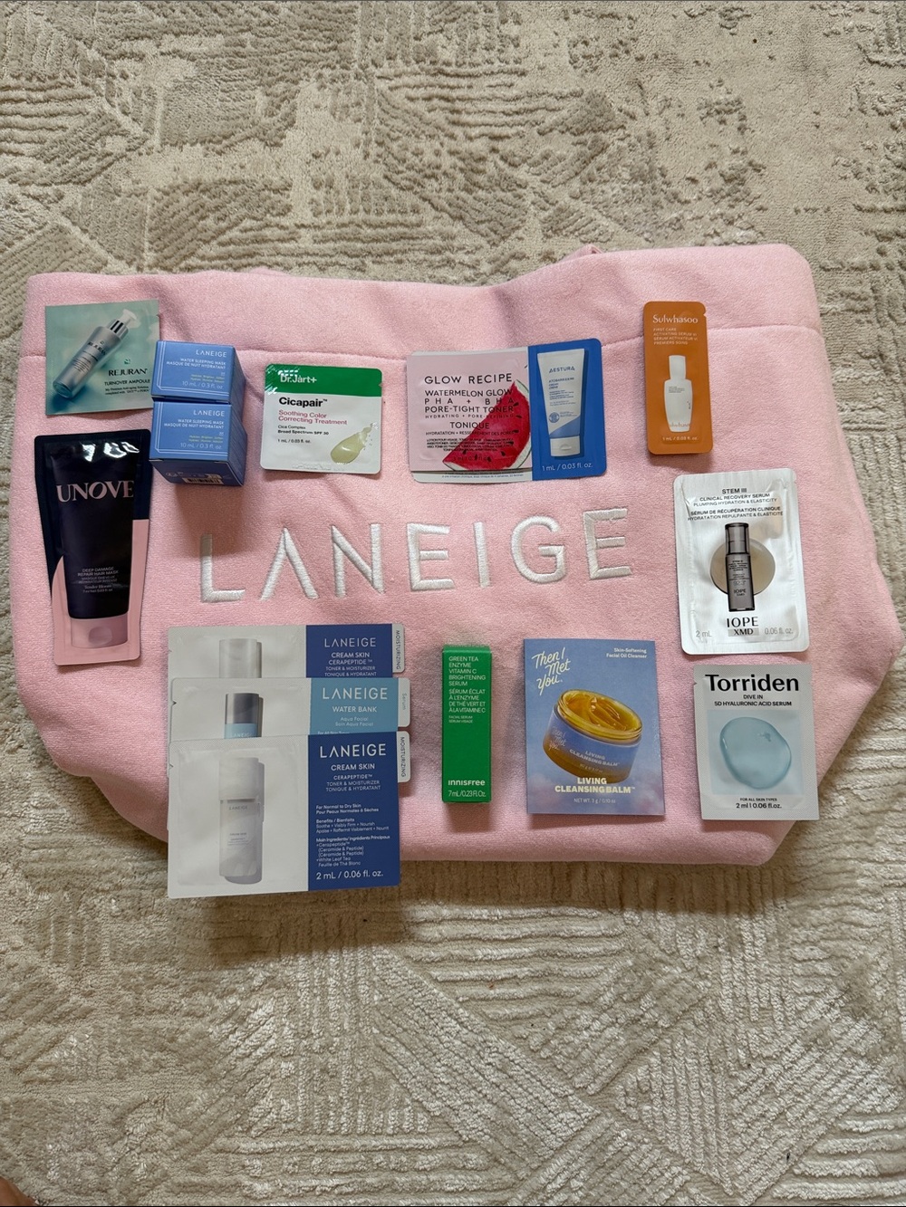 LANEIGE Pastel Pink Cosmetic Pouch with Skincare Sample Assortment